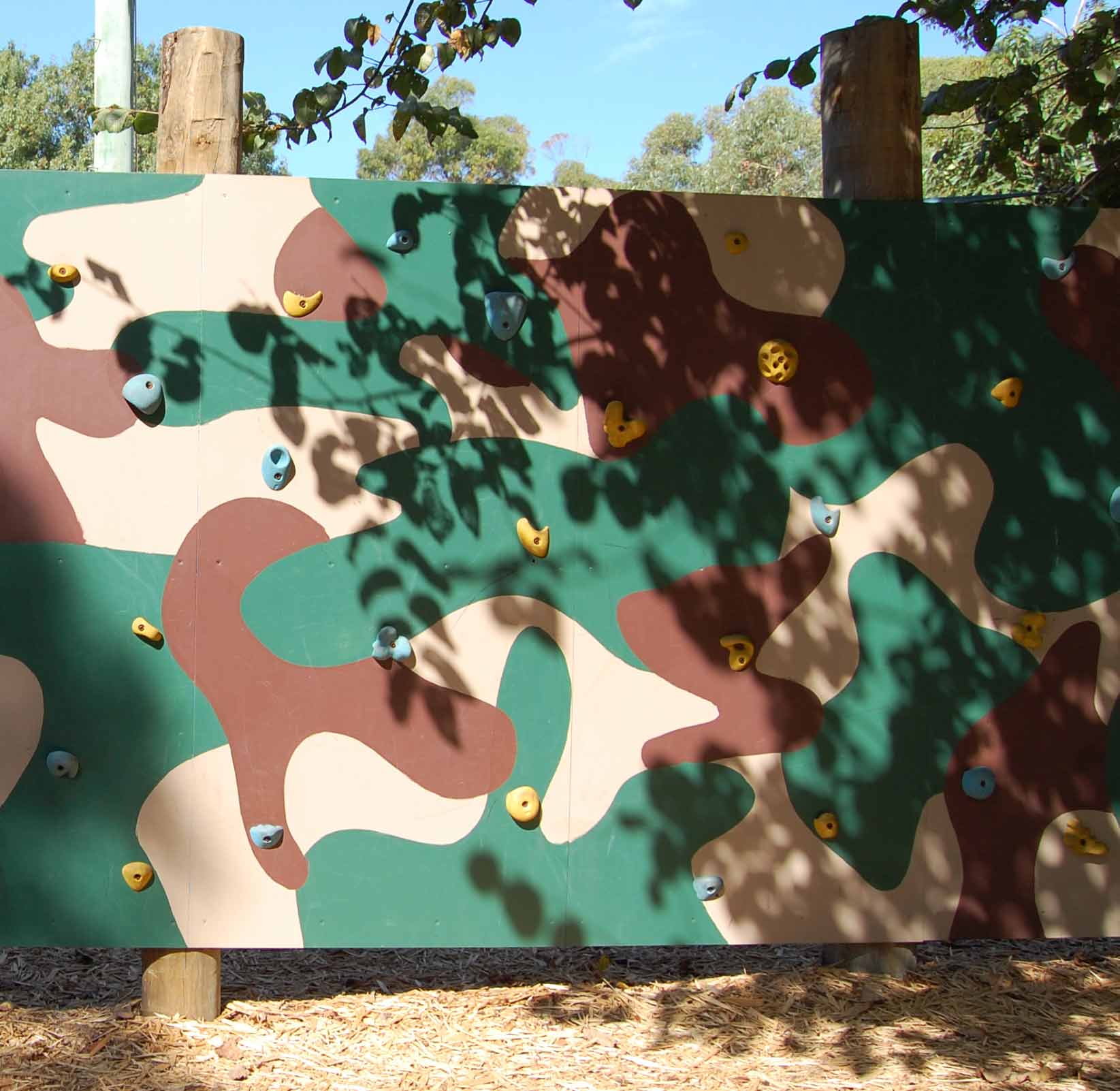 The traversing wall is painted in camouflage colours